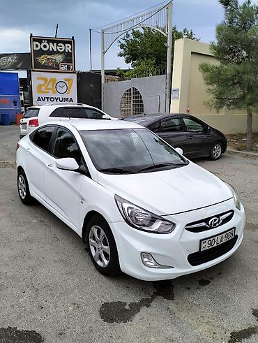 bmw e60 m: Hyundai Accent: 1.6 l | 2011 il Sedan — 4