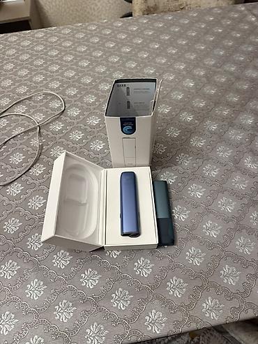 aşbaz papağı: Ikisi birlikde satilir. Tek tek ferqli qiymet olacaq IQOS ILUMA One — 4