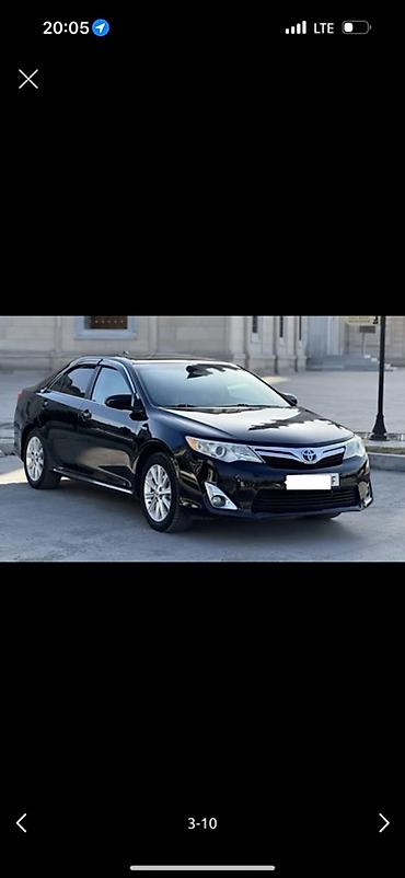 салон машины: Toyota Camry: 2013 г., Гибрид, Седан — 1