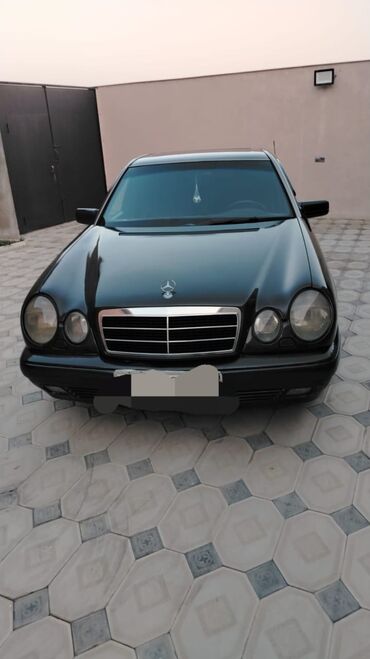 arx açan: Mercedes-Benz E-Class: 2.3 l | 1995 il Sedan