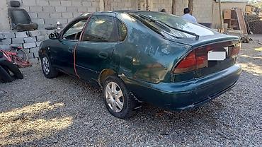 corolla 2004: Toyota Corolla: 1993 г., 1.4 л, Механика, Бензин, Лифтбек — 5