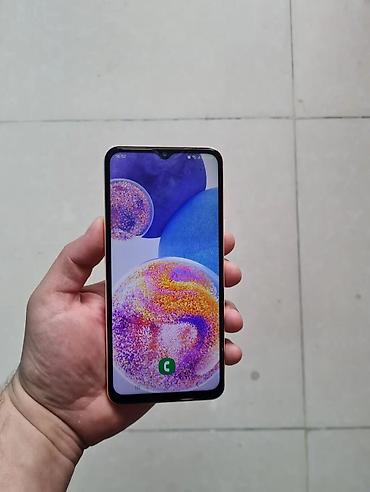 Мобильные телефоны: Samsung Galaxy A23, 64 ГБ, цвет - Розовый, Отпечаток пальца — 5