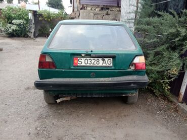электрический скутеры: Предлагается к продаже хэтчбек Volkswagen Golf III в зеленом цвете
