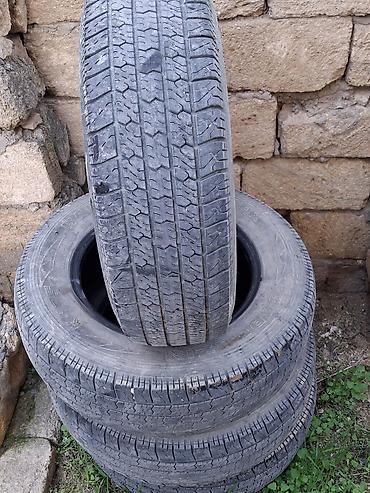 masin diskleri: Avtomobil üçün **BARGUZIN** markalı şinlər. - **Ölçü:** 205/70 R15 — 1