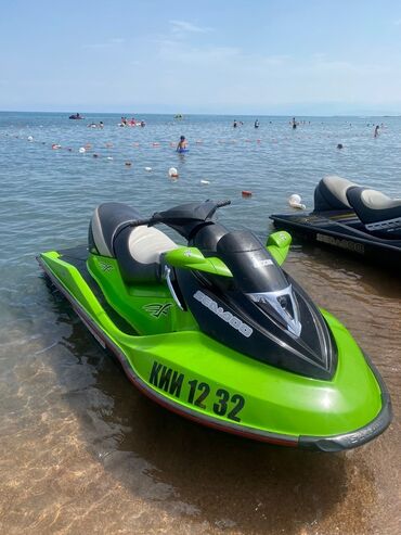 продаю или меняю на дом: Гидроцикл Sea-Doo зеленого цвета с черными и белыми элементами. Модель