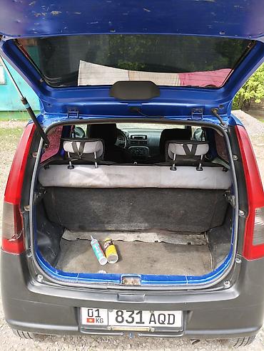 1: Daihatsu Cuore: 2003 г., 1 л, Механика, Бензин, Хэтчбэк — 6