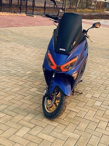 t max: Скутер/максискутер 150–200 см³ класса (визуально — форм‑фактор Yamaha — 3