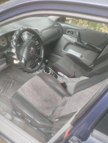 мазда фамили: Mazda Familia: 2003 г., 1.6 л, Механика, Бензин, Универсал — 4