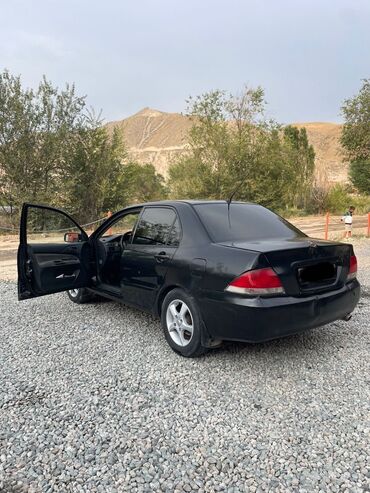 Mitsubishi: Mitsubishi Lancer: 2005 г., 1.6 л, Механика, Бензин, Седан — 11