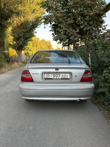 куплю дом на колёсах: Автомобиль Honda Civic в кузове седан, выполненный в серебристом