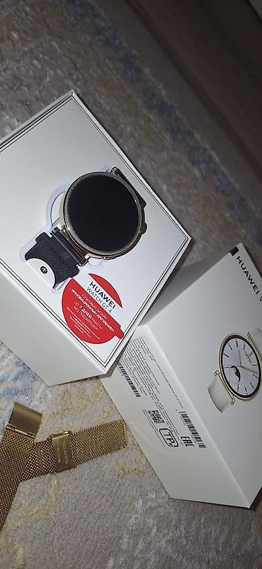 qi̇zi̇l: Huawei Watch GT 4 (41 mm) – qızılı rəngli korpus, dairəvi dizayn — 1