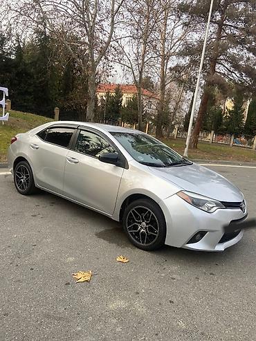 4 göz maşını: Toyota Corolla: 1.8 l | 2014 il Sedan — 2
