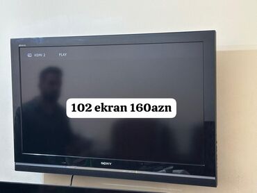 Телевизоры: Sony brendinin 102 ekran ölçüsünə malik qara rəngli televizoru. Geniş