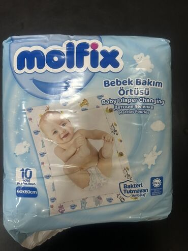 usaq onlukleri: Molfix brendindən uşaq bezi dəyişdirmək üçün istifadə olunan, "Bakteri