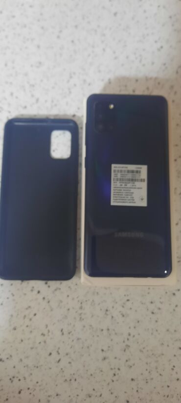 телефон fly ds107: Samsung Galaxy A31, 128 ГБ, цвет - Черный, Сенсорный, Отпечаток пальца, Две SIM карты