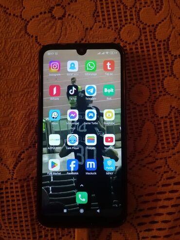 телефон флай 7: Xiaomi Redmi 7, 32 ГБ, цвет - Черный, 
 Отпечаток пальца