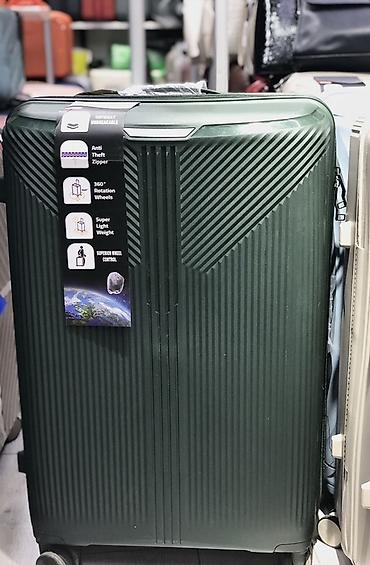 Чемоданы: Чемодан, Новый, Материал: Полиэстер, Большой (более 70 л), На колесах — 7