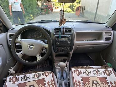 Транспорт: Mazda Demio: 2002 г., 1.5 л, Автомат, Бензин, Хэтчбэк — 6