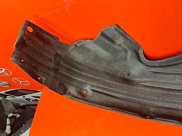 Подкрылки, брызговики, защита днища: Подкрылок колесной арки черного цвета, изготовленный из прочного — 4