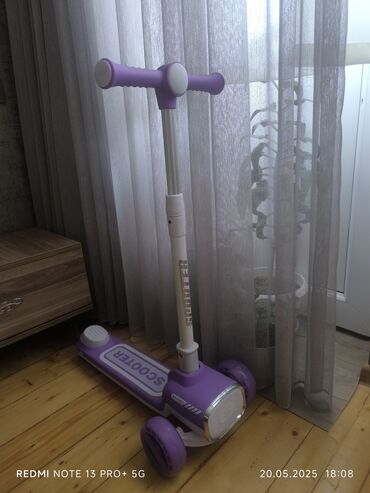 Uşaq üçün elektrik maşınları: Skuter satılır, yenidir, işıqları yanır,musiqilidir,açılıb