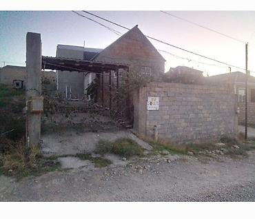 Həyət evləri və villaların satışı: Satilir heyet evi,manalit evdir,144 kv,ev 3 sot torpaqda tikilib, hem — 8