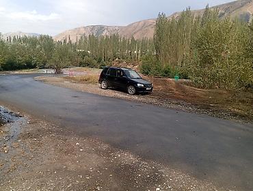 Mazda Demio: 2000 г., 1.3 л, Механика, Бензин, Седан