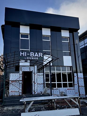 Фасадные работы: Современный двухэтажный дом с плоской крышей и панорамными окнами. - — 6