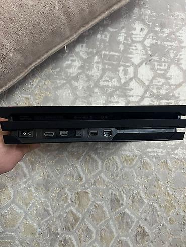 PS4 (Sony Playstation 4): Sony PlayStation 4 Pro oyun konsolu - Rəng: Qara, üçqat korpus — 3