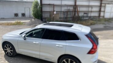 опель внедорожник: Автомобиль Volvo XC60 белого цвета с панорамной крышей. Этот кроссовер