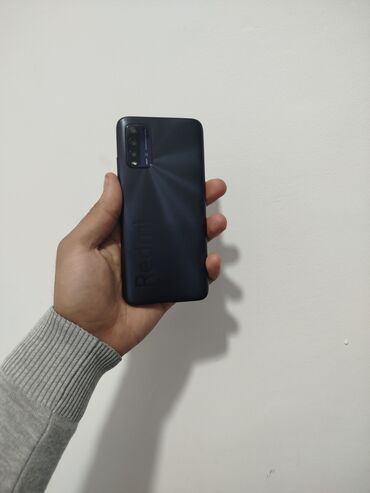 Xiaomi: Xiaomi Redmi 9T, 128 GB, rəng - Boz, 
 Düyməli, Barmaq izi, İki sim kartlı