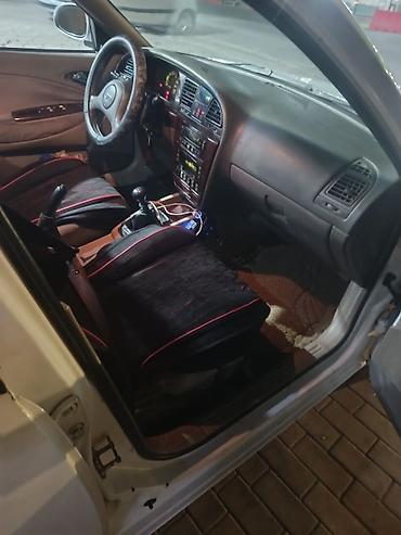 сетка кду: Daewoo Nubira: 1999 г., Бензин, Седан — 8
