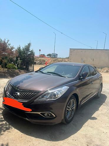 grandeur disk: Hyundai Grandeur: 2 l | 2014 il Sedan — 7
