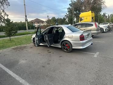 мазда 323 1994: Mazda 323: 1998 г., 1.6 л, Механика, Бензин, Седан — 4
