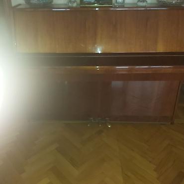 Аккорд piano (upright) – klassik taxta korpus, parlaq lak örtüyü ilə