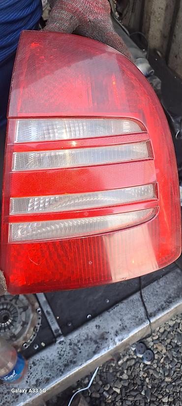 pass: Задний фонарь (левый) для автомобиля Volkswagen Passat B6 — 1