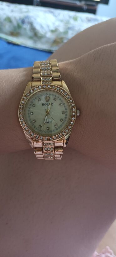 sat sa rimskim brojevima: Classic watch, Rolex, Female