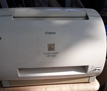 чёрно белый принтер: Принтер Canon Laser Shot LBP-1120, выполненный в светлом корпусе
