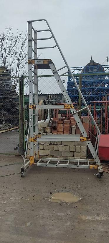 lesa icarəsi: Строительные леса —scaffold-demir ayaqaltilar tikintide — 3