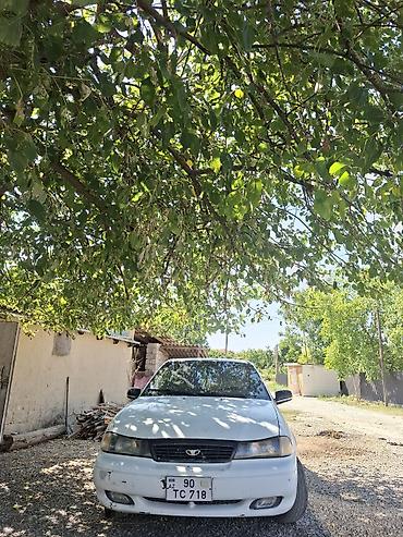 Daewoo: Model: Daewoo Nexia sedan Kuzov: 4 qapılı, ağ rəng Yanacaq: Benzin — 1