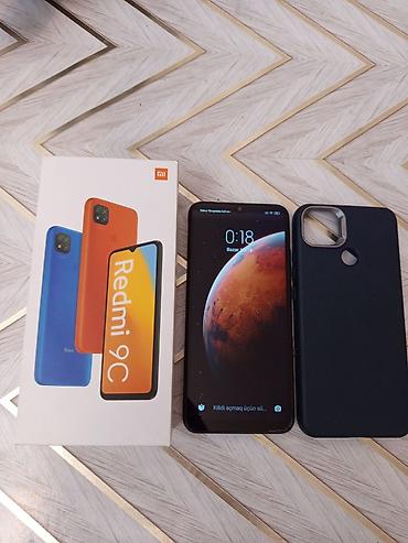 nokia magic max pro: Redmi 9C, 128 GB, rəng - Qara, Zəmanət, Barmaq izi, Simsiz şarj — 1