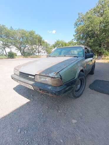 авто лейлек: Mazda 626: 1985 г., 2 л, Механика, Бензин, Седан