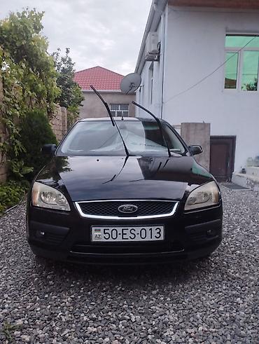 niva satilir: Ford Focus sedan – qara rəng. - Kuzov: 4 qapılı sedan, ön və arxa — 1