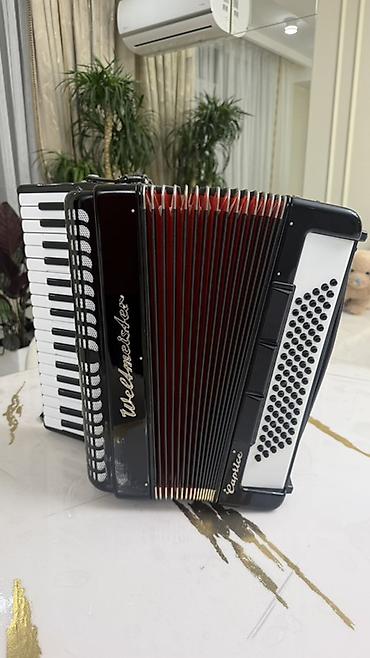 пятирядный баян: Аккордеон Weltmeister Caprice - Тип: клавишный аккордеон - — 6