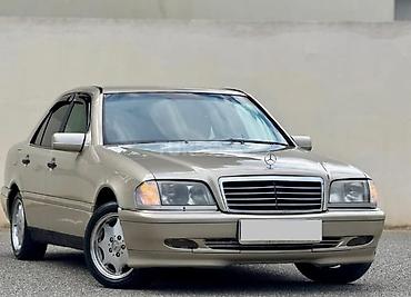 mersedes 111: Mercedes-Benz C-Class sedan (W202) - Kuzov: 4 qapılı sedan, bej rəng — 9