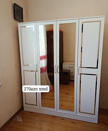 boy guzgulər: Ağ rəngdə 4 qapılı paltar şkafı. Orta hissədə 2 ədəd tam boy güzgü — 2