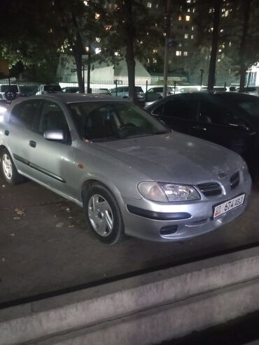 алабука машина: Nissan Almera, 5‑дверный хэтчбек, серебристый цвет. Особенности и