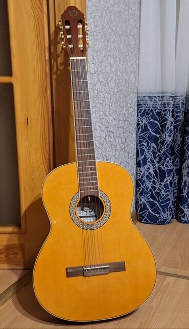 gitara işlənmiş: Klassik gitara, İşlənmiş, Ünvandan götürmə