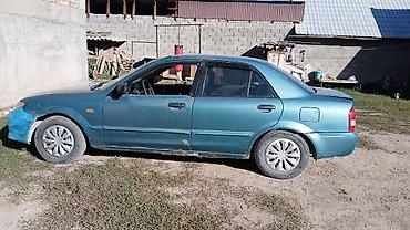 mazda 323 2003: Mazda 323: 2002 г., 1.6 л, Механика, Газ, Седан — 1