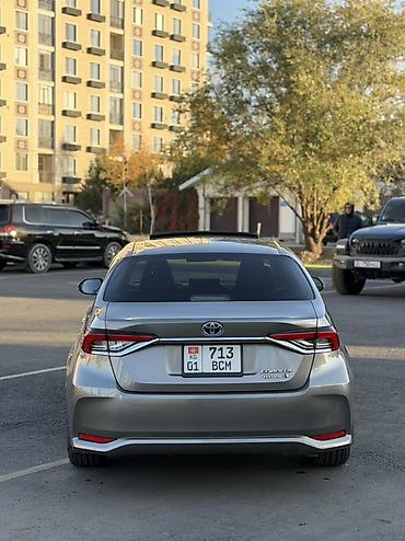 byd e9 1: Toyota Corolla: 2019 г., 1.8 л, Вариатор, Гибрид, Седан — 2