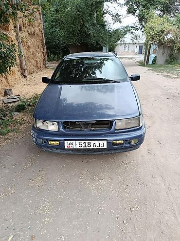 мир света: Volkswagen Passat: 1994 г., Седан — 1